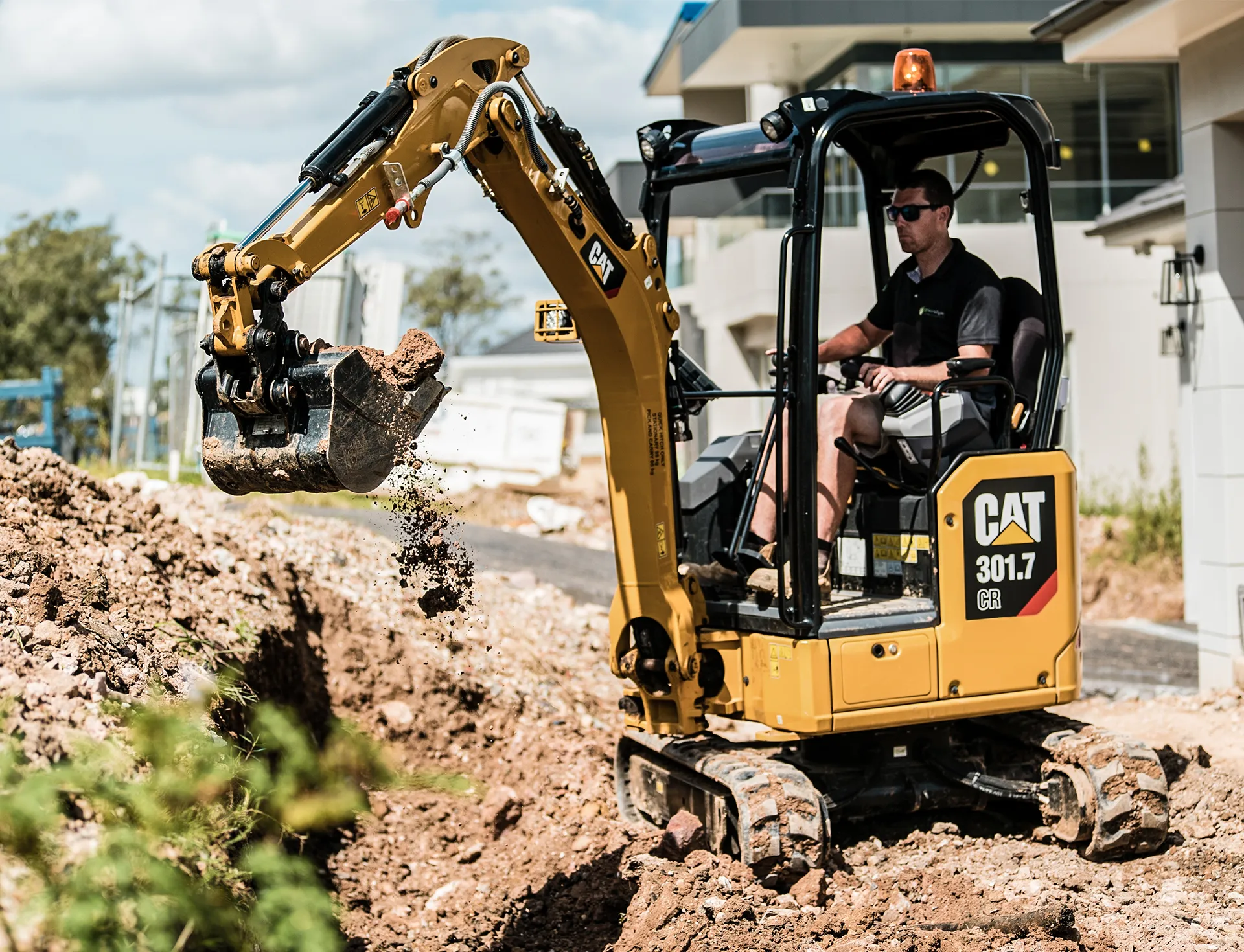 Electric mini excavator at work